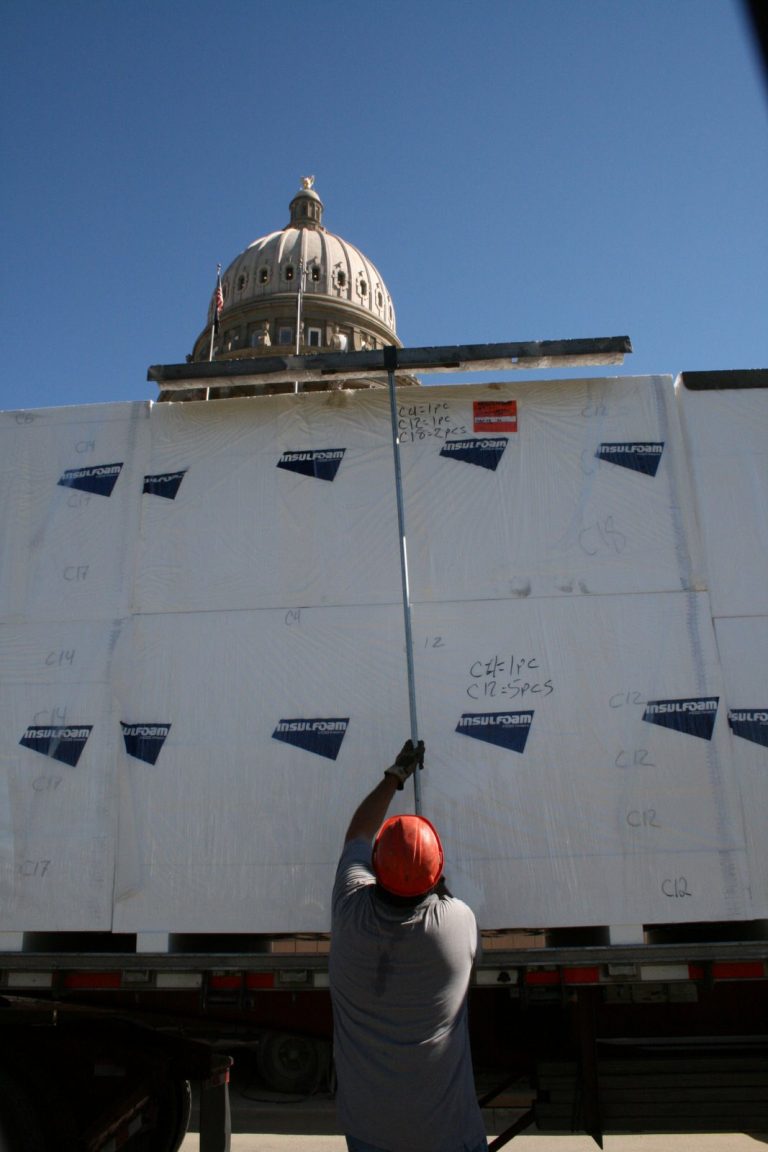 Unloading Geofoam pieces from a semi-trailer.  The Geofoam insulates and protects the concrete shell of the Capitols underground expansion wings.